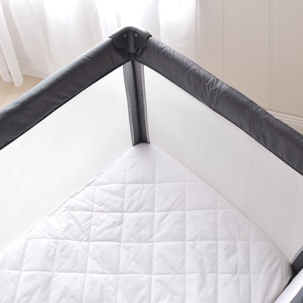 Smartdri-portacot-on-cot-grande